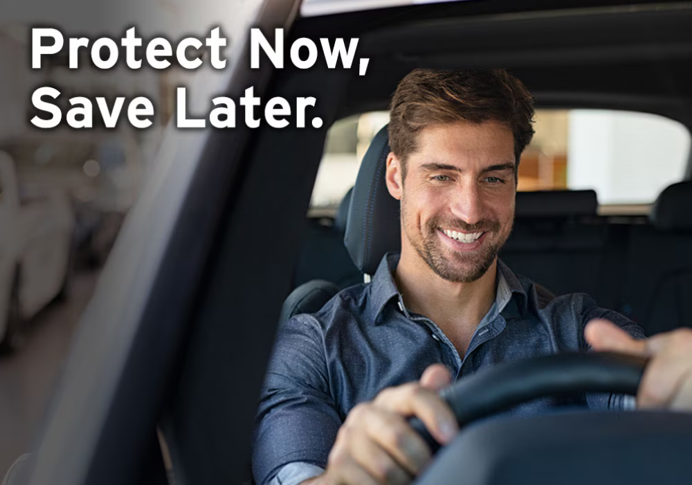 Person driving a car and smiling with floating words that read Protect Now Service Later